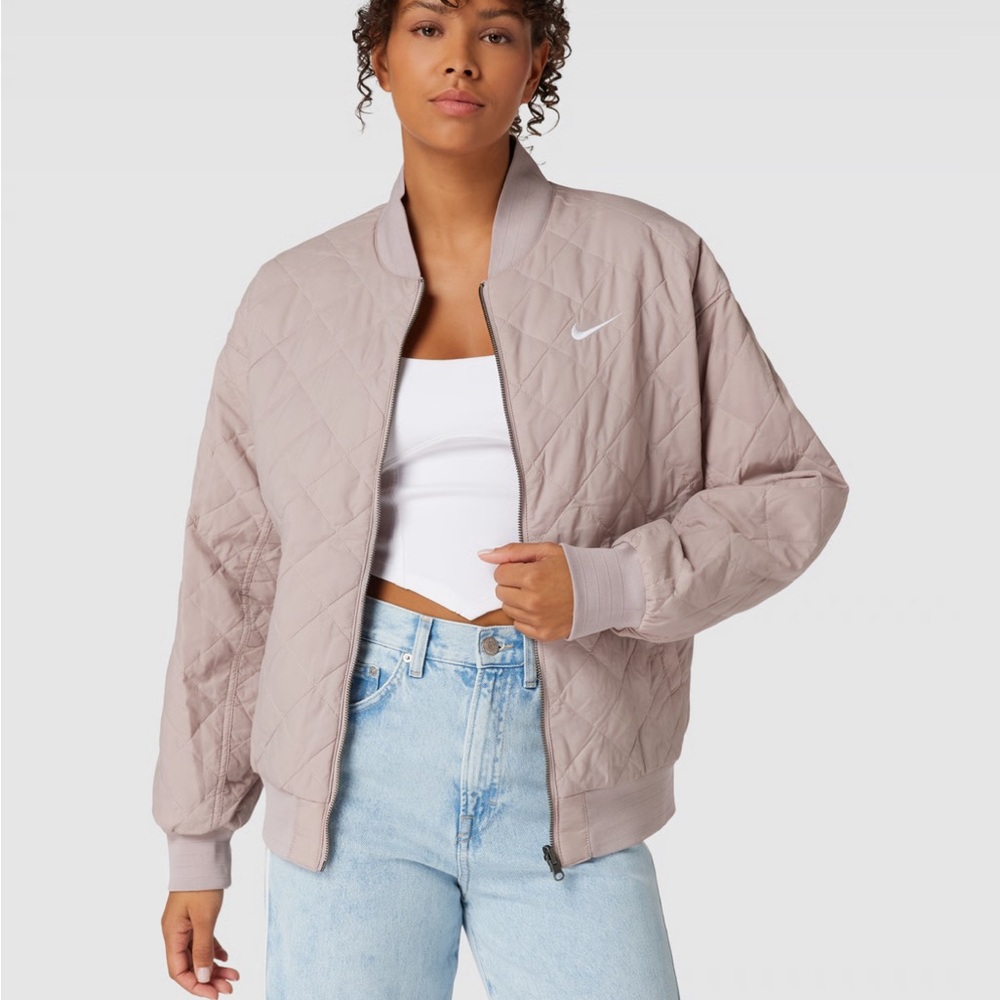 NIKE WOMEN’S REVERSIBLE VARSITY BOMBER JACKET